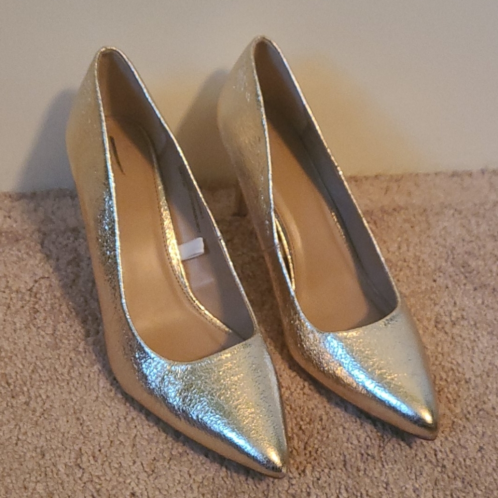 Gold high heels